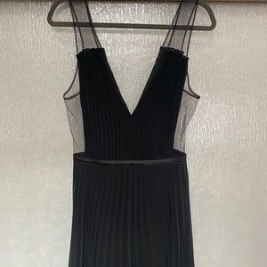 Never worn Bebe Dress with sheer cutouts/details